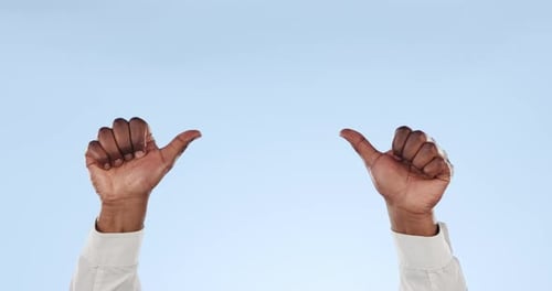 Yes, thumbs up or hands of person in studio isolated on blue background for feedback