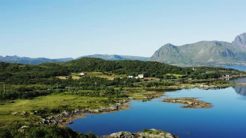 County Road Amidst Greenery And Mountain Range