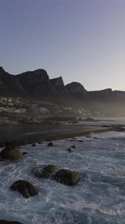 Beautiful View of Waves Crashing on Camps Bay Shoreline and Tidal Pool