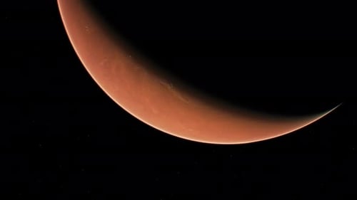 Red Planet Crescent Rotating in Starry Deep Space