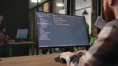 Data Scientist Working With Computer In Office Of ITCompany Writing Program Code On Monitor