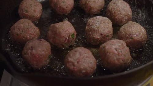 Frying Meatballs in a Pan for a Meal