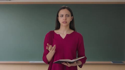 Indian female teacher solving student problem
