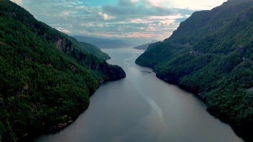 Breathtaking View of Serene Fjord Landscape in Norway at Golden Hour