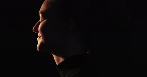 Woman's Face in Dramatic Light