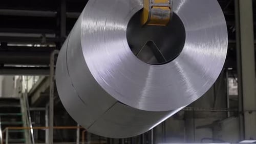 Large Multi Layered Iron plates. Car Plant. Close Up.