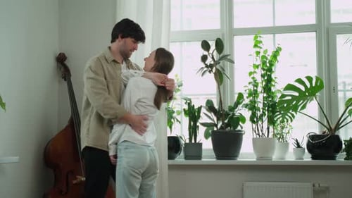 Romantic Couple Dancing Together at Home