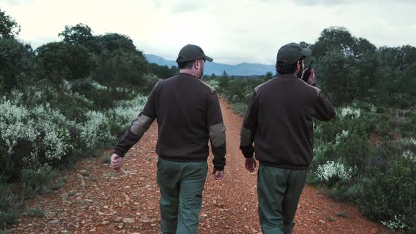 Team of Park Rangers with Uniform Using Walkie Talkie Radio to Monitor ...