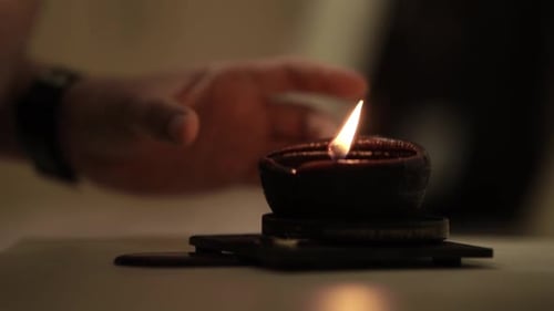 Oil Lamp Flame Extinguished Gently, Wisps of Smoke