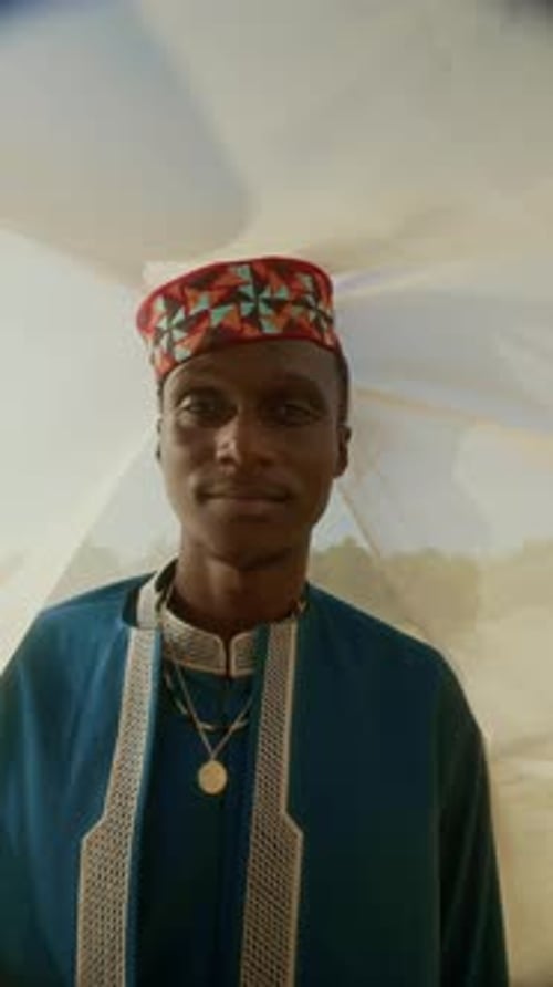 Portrait of Young Black Man Under Veil