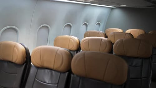 Inside commercial air plane. passenger cabin.