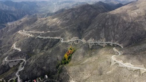 Gravel roads twist their way up and down rugged mountain pass, ARG