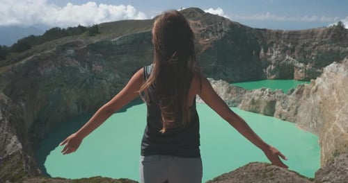 Tourist Woman on Volcano Kelimutu Crater Lakes
