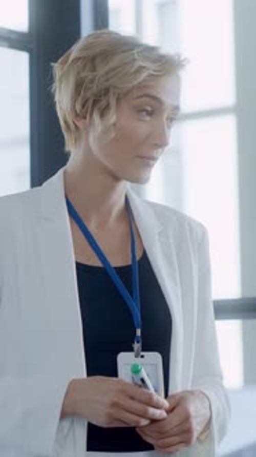 A Professional Businesswoman Working Efficiently in a Modern Office Environment Setting