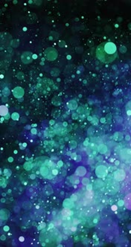 Green And Violet Particles Float In Unison
