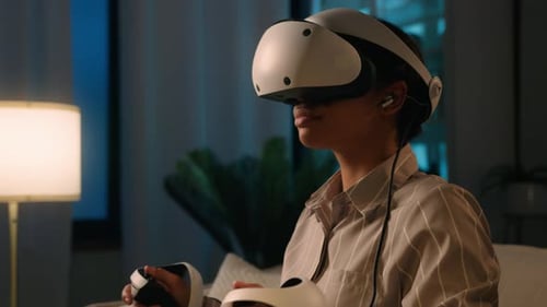 Woman Immersed in Virtual Reality Gaming at Home
