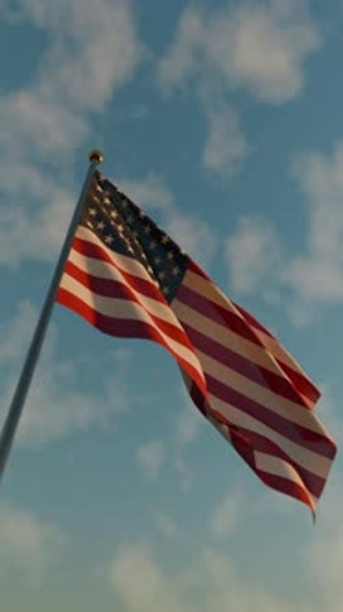 Realistic American Flag Waving Against Blue Sky