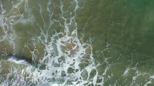 Aerial View of Wild Ocean Waves Crushing the Beach by Drone