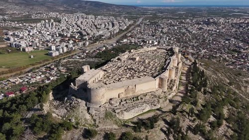 Medieval Hilltop Fortress in Turkey with Cityscape in Background