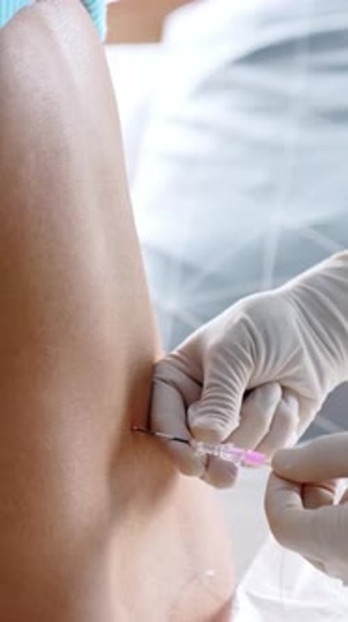 Close Up of IV Injection on Arm