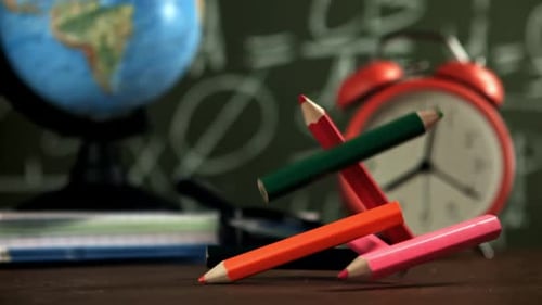 Pencils Fall on the School Desk Filmed on a Highspeed Camera at 1000 Fps