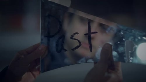 Man's Bruised Reflection in Broken Mirror at Night