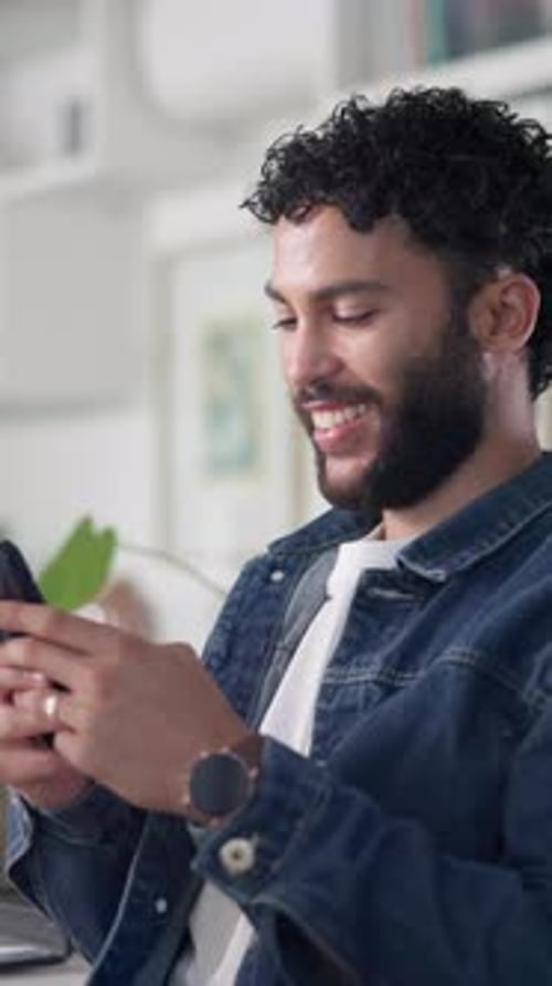Business, man and happy with phone in office for client chat, typing email
