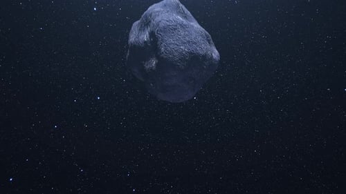Asteroid driftet lautlos durch den sternengefüllten Kosmos