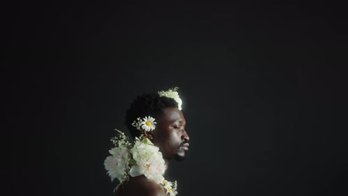 Man Adorned with Flowers