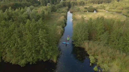 Aerial view of persons paddling on stand-up paddle board, Friesland, Netherlands