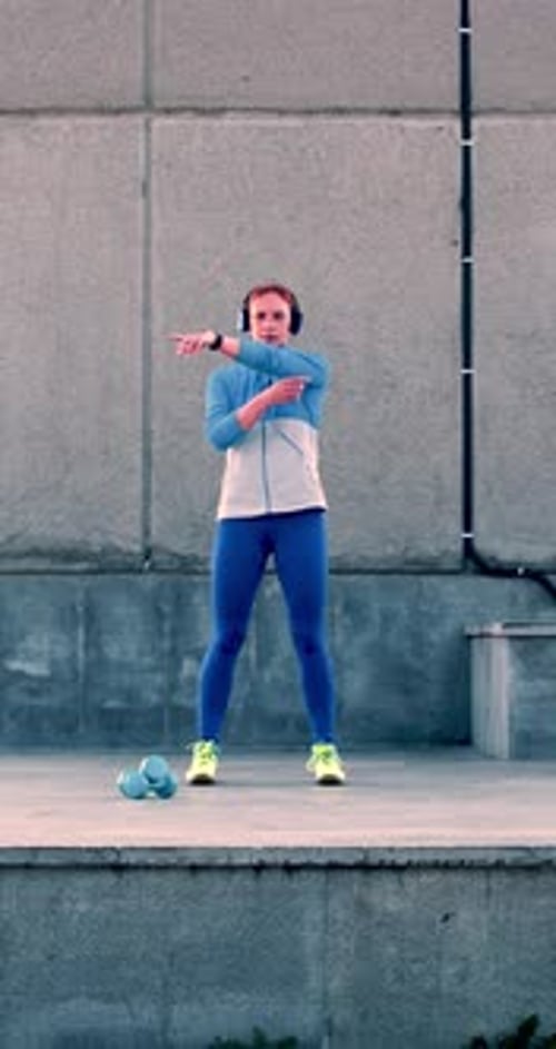 Slow Motion Footage of a Morning Workout of a Middle Aged Woman
