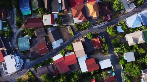 Top Aerial Drone Footage of Asian Village with Residential Houses and Asphalt Road