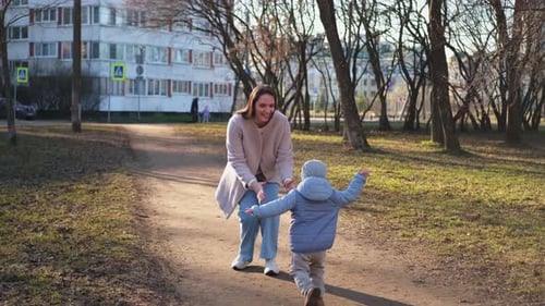 Happy Family Outdoor Mother Child on Walk in Park Mom Playing with Baby Son Outdoor Woman Little