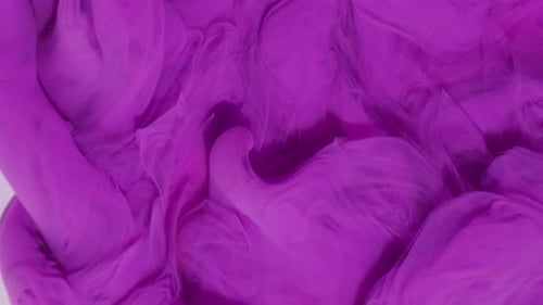 Purple Ink Cloud Slowly Spreading in Water