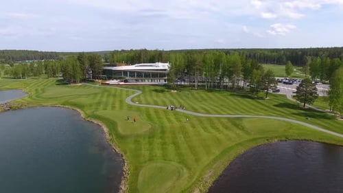 The Serene Golf Course Features Breathtaking Picturesque Water Features Throughout Its Layout