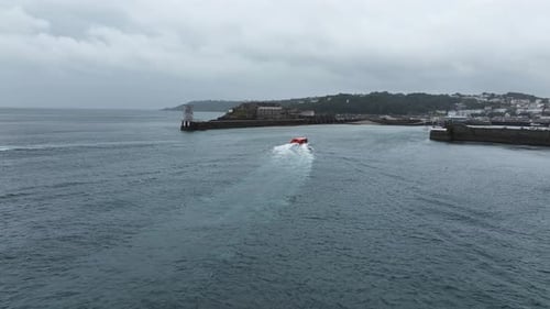 Drone Shot of Local Ferry Boat Sailing Into St. Peter Port Harbour, Guernsey, Channel Islands