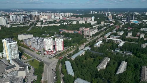 Aerial Cityscape with Residential Buildings and Green Trees Clip