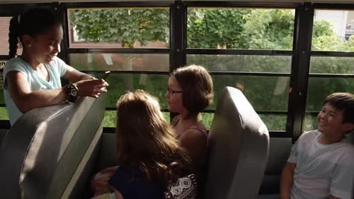 kids on the school bus - Kids texting