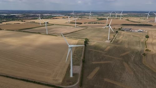 Wind Turbines Over Golden Fields in Bedford