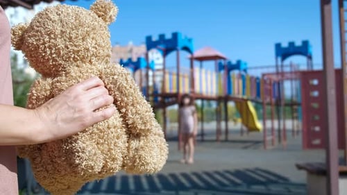 Kidnapping with Toy on Playground