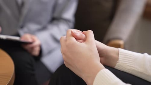 Close-Up of Caring Hand Holding in Support
