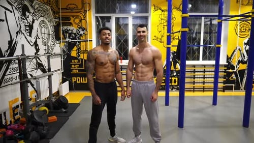 Portrait of Happy Muscular Afro American and Caucasian Sportsman at Fitness Centre Male Strong