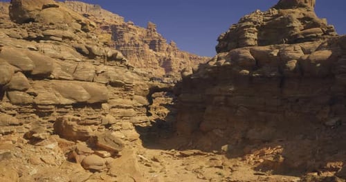Natural Rock Formations in a Desert Landscape During Midday Sunlight