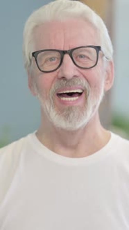 Senior Man with Glasses Smiling