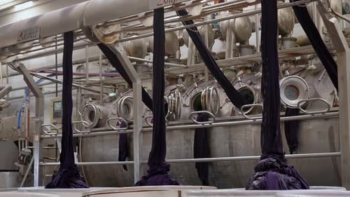 Fabric Dyeing Machine Processing Textile Material at Factory