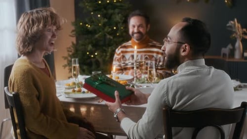 Friends Gather for Christmas Gift Giving