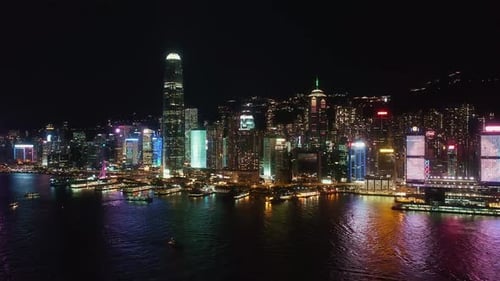 Breathtaking Hong Kong Night Skyline Glowing With Vibrant City Lights