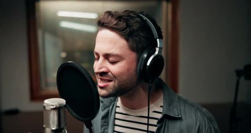 Music, microphone and man with singing in studio for production, entertainment and broadcast