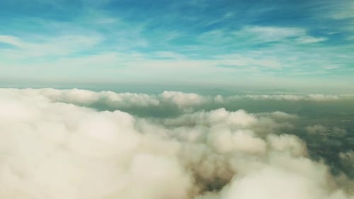 4k drone footage of clouds high above in the atmosphere