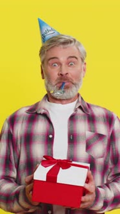 Happy Mature Man Surprise Gift Moment Party Cone Hat Joyful Shock Red Bow Birthday Excitement